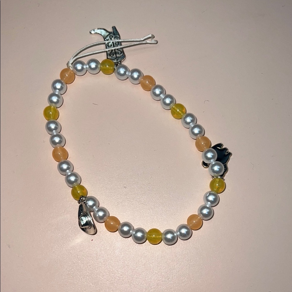 Pearl and Yellow Beaded Bracelet with Charms